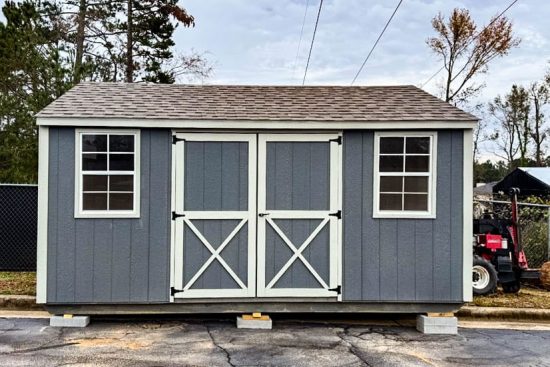 Gray 12x16 Utility shed with silver maple trim and barn-style doors ( with X detail )