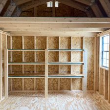 10x16 Garden Shed Max interior view showing wooden framing and built-in shelves