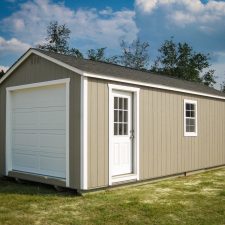 A custom storage shed garage in Georgia with painted wood siding