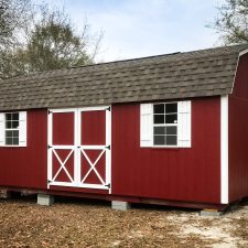 A red custom storage shed with a loft in Georgia